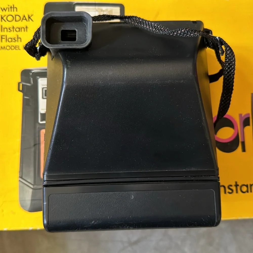 Color burst Kodak instant camera with flash